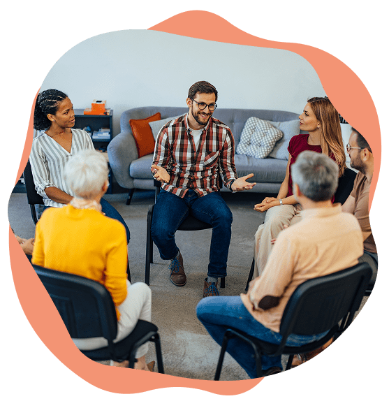 Group discussion in a circle of chairs.